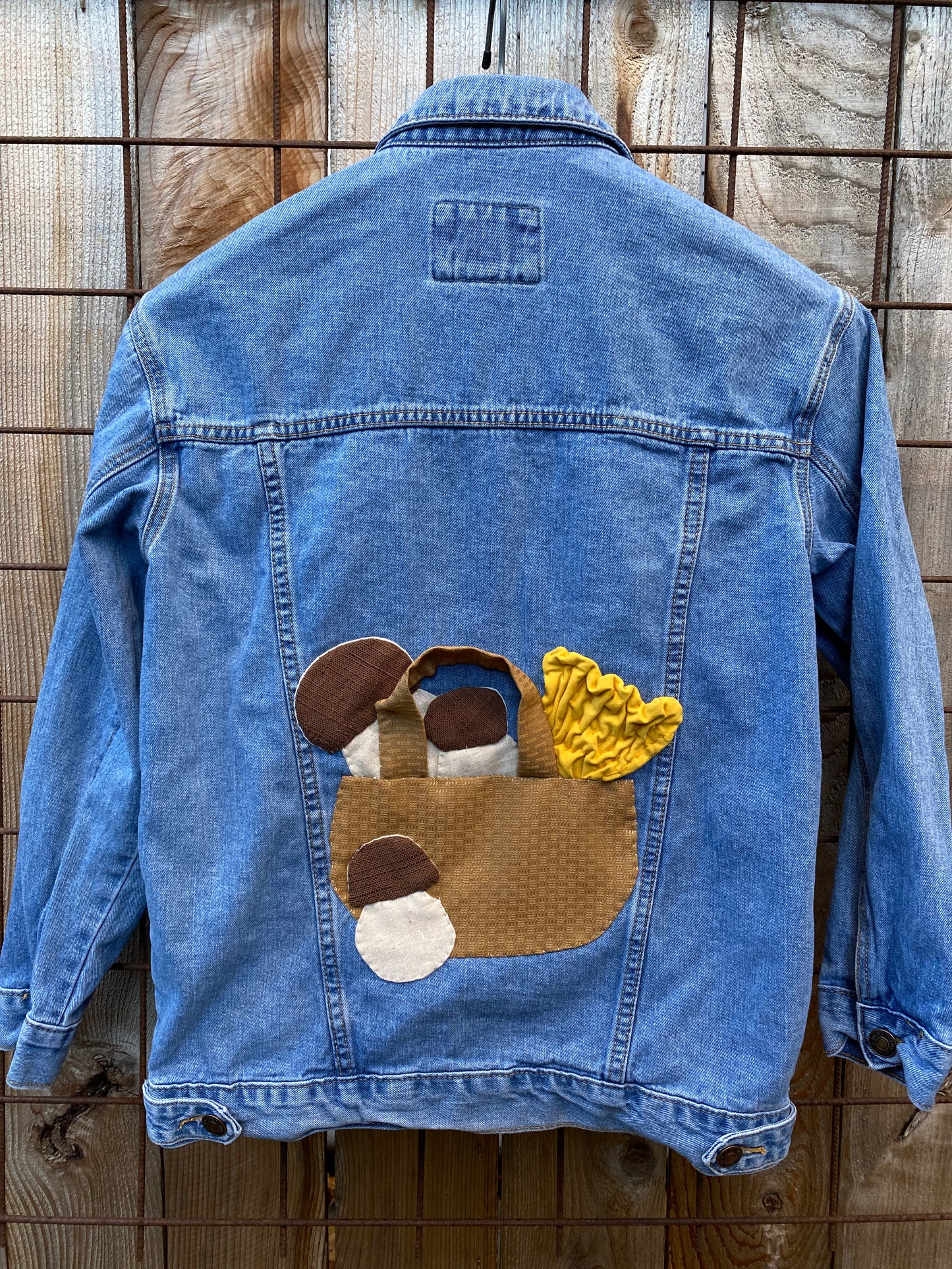 Denim jacket with hand sewn porcini and chanterelle