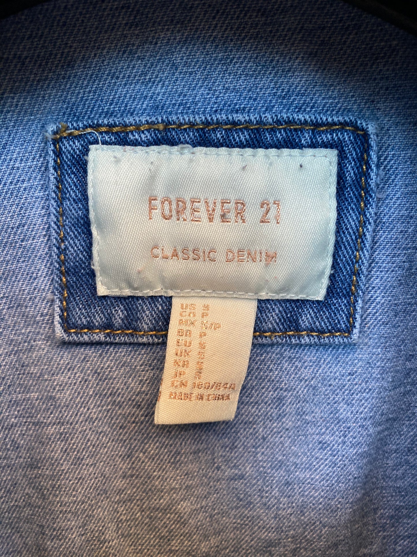 Denim jacket with hand sewn porcini and chanterelle