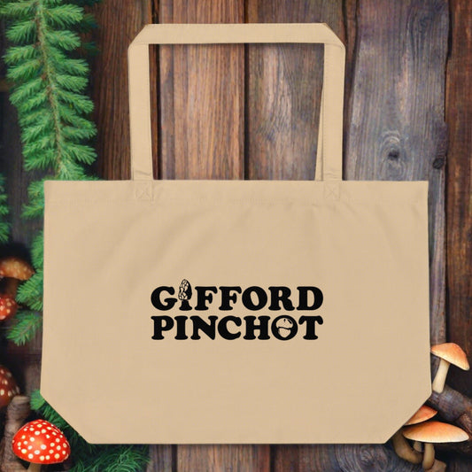 A reusable sturdy canvas tote-bag featuring the phrase Gifford Pinchot. there is a morel mushroom where the letter I should be in the word Gifford and a porcini where the O should be in Pinchot.