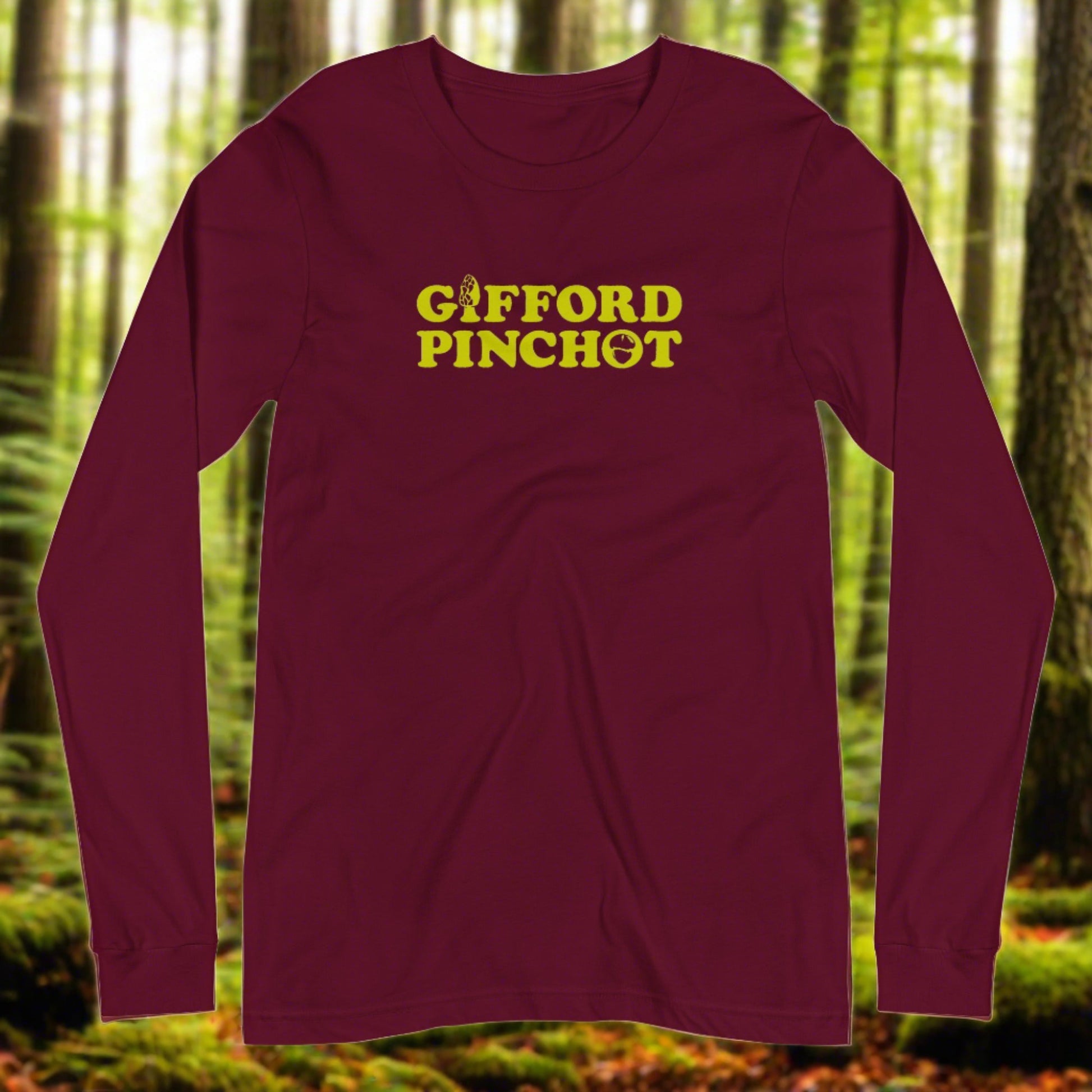 a long sleeve t-shirt featuring the phrase Gifford Pinchot. there is a morel mushroom where the letter I should be in the word Gifford and a porcini where the O should be in Pinchot.