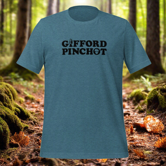 a teal t-shirt featuring the phrase Gifford Pinchot. there is a morel mushroom where the letter I should be in the word Gifford and a porcini where the O should be in Pnchot.