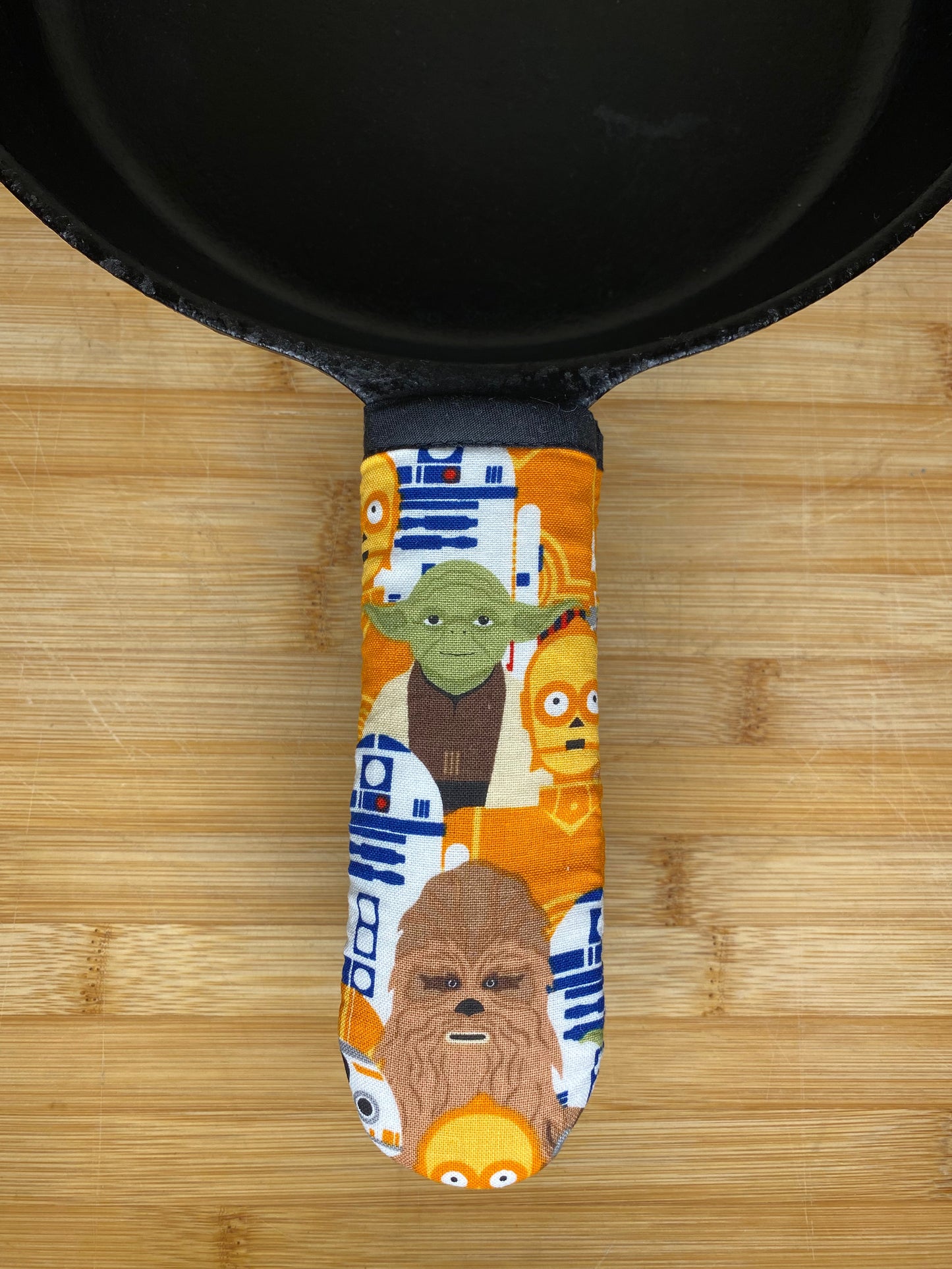 Cast iron skillet handle, heat resistant, space wars fabric