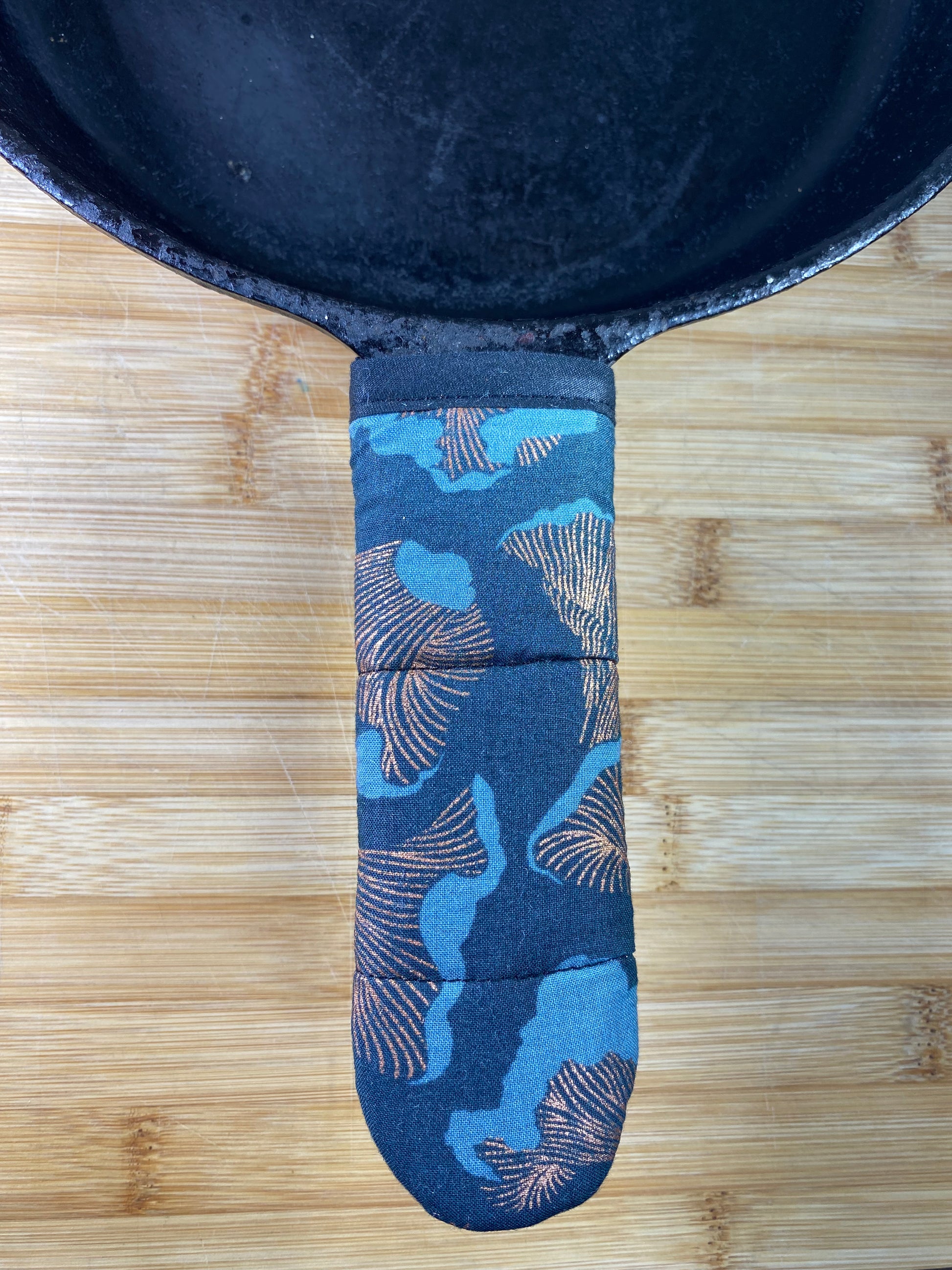Cast iron skillet handle, heat resistant, chanterelle mushroom fabric